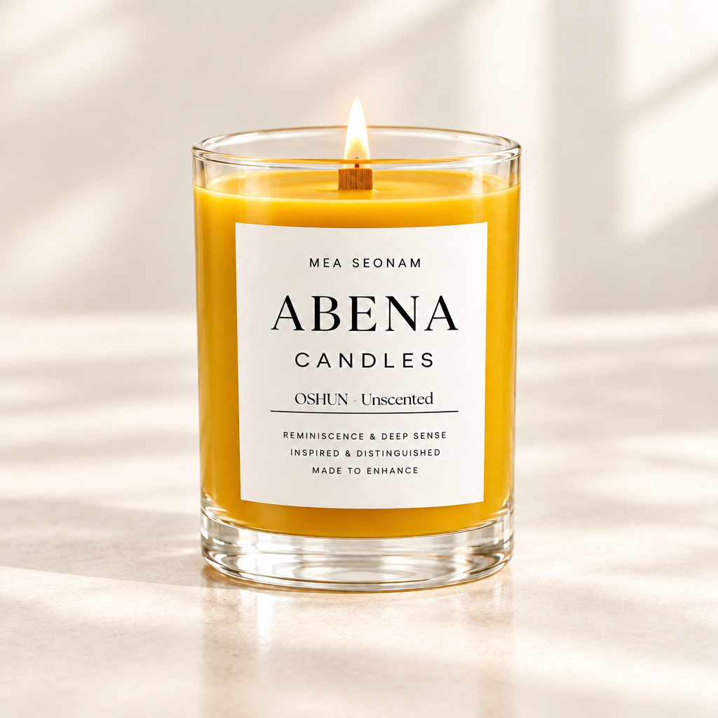 Yellow OSHUN Unscented candle with a lit wooden wick